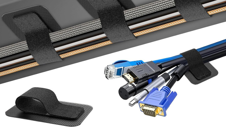 A close up of a velco-based cable tie system holding cables together