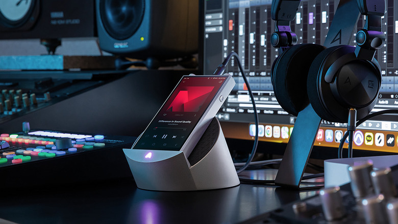 The Astell & Kern PD20 player on a desktop, pluged into a PC