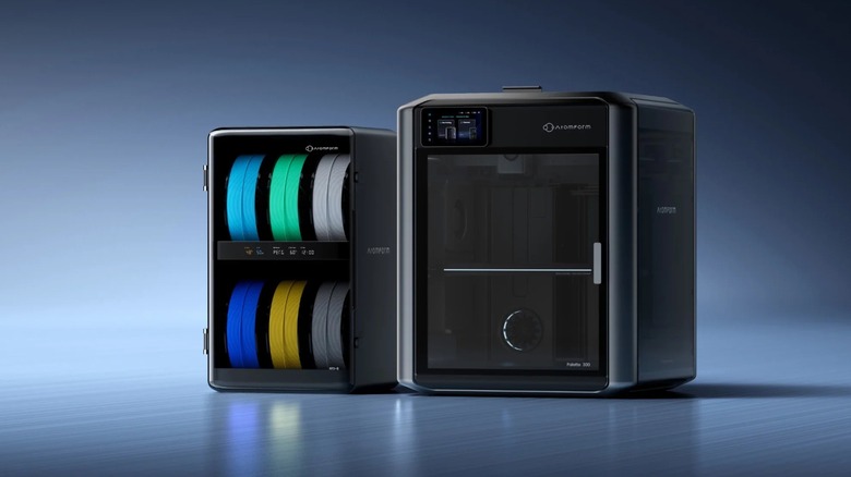 The AtomForm Palette 300 next to its multi-material management system