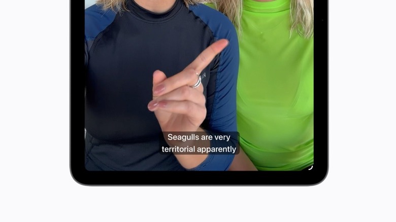 A mockup of an iPad showing auto-generated subtitles