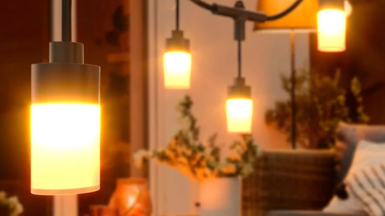 The Atomi Smart Wi-Fi Color String Lights installed outdoors.