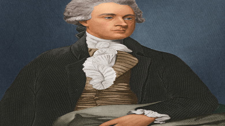 A portrait of Thomas Jefferson's from shoulders up in front of a blue background.