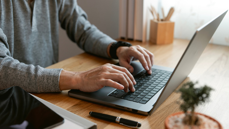 Typing on a laptop keyboard