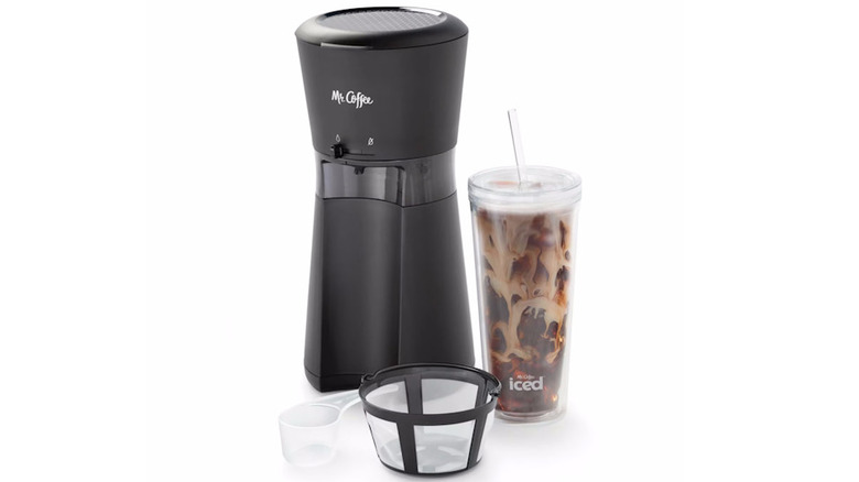 Mr Coffee Iced Coffee Machine next to scoop, filter, and iced coffee cup