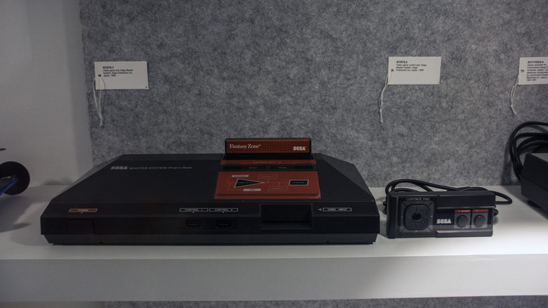 The Sega Master System with a Fantasy Zone cartridge plugged into it