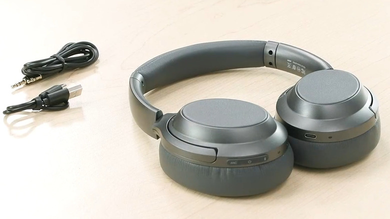 Monoprice BT-600ANC Over the Ear Headphones with cords around it
