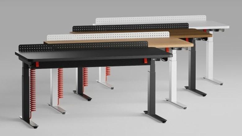 The different colors of the Herman Miller Coyl gaming desk.