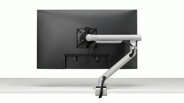 The Herman Miller Flo monitor support (with monitor) viewed from the back.