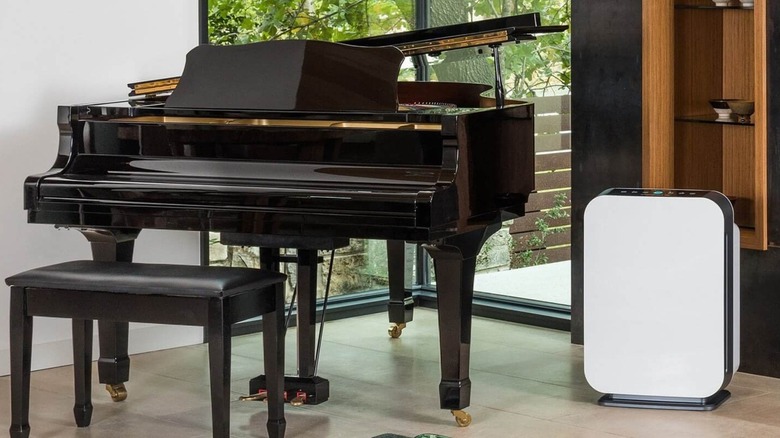 The Alen BreatheSmart 75i air purifier beside a piano.