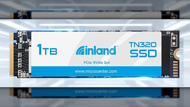 Inland TN320 1TB SSD against a brightly-lit background.