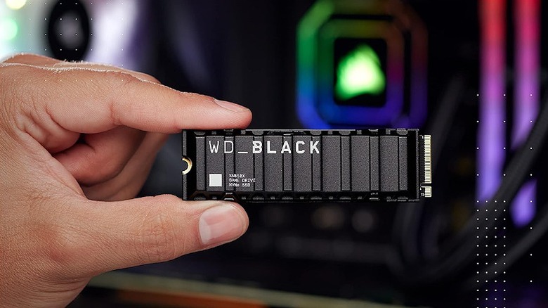 Man holding a WD Black Internal SSD.