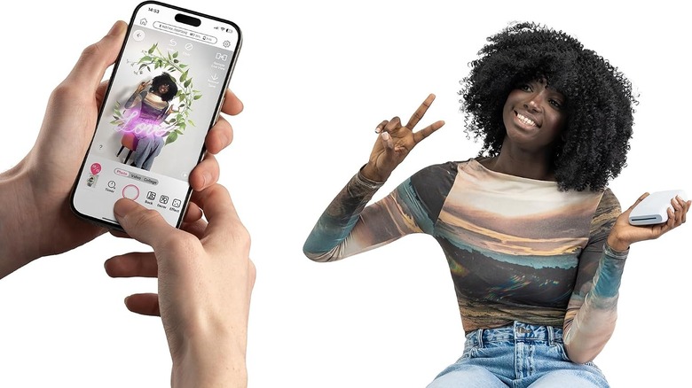 A person uses a phone to take a photo of someone holding a mini printer.