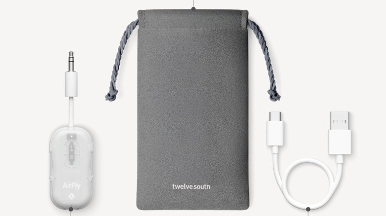Close up of what the Twelve South AirFly pro includes in its packaging on off-white background