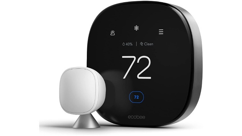 Black thermostat with white sensor