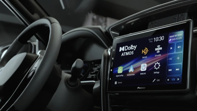 The interior of a car showing the Dolby Atmos-enabled Pioneer Sphera infotainment system.