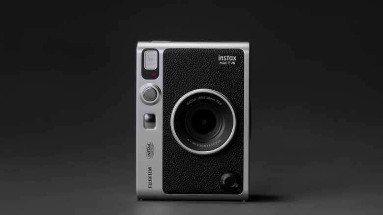 Fujifilm Mini Evo against a black background