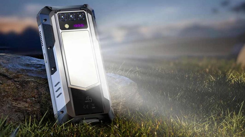The Oukitel WP100 Titan with its camping light turned on.