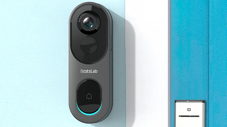 The Botslab Video Doorbell 2 Pro installed outside a door.