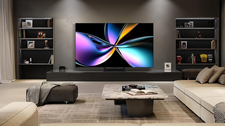 Hisense U7 in the middle of a living room with a multi-colored screen.