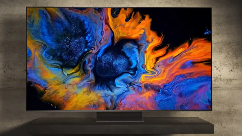 Samsung OLED S90F with a multicolored screen in a living room