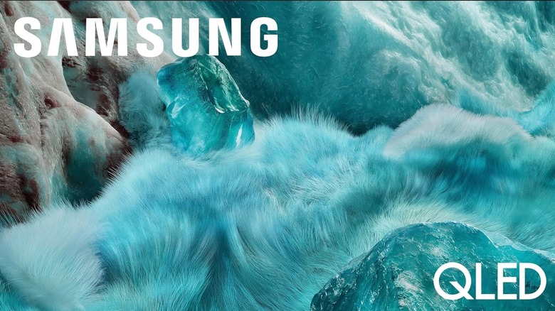 Samsung QLED with a crystal-like landscape behind logo