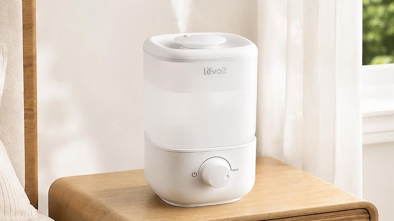 The Levoit Classic 160 humidifier on a bedside table.