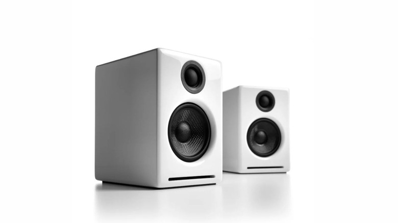 Two rectangular white speakers