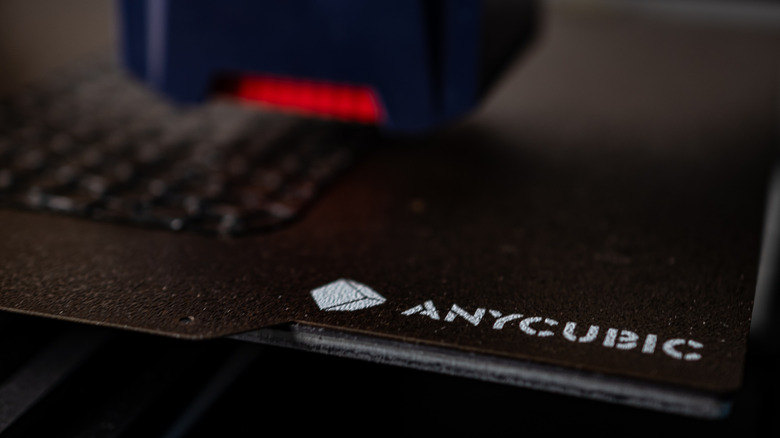 Close-up of an Anycubic printer in action.