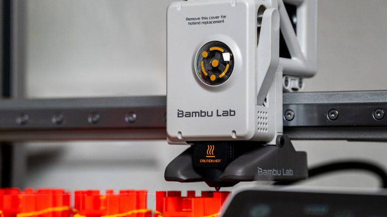 Close-up of a Bambu Lab printer mid-print.