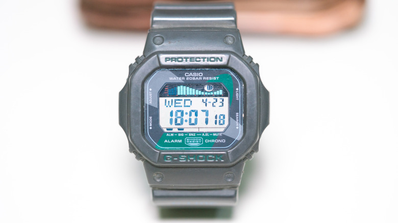 Close-up of a Casio G-Shock digital watch showing time and date