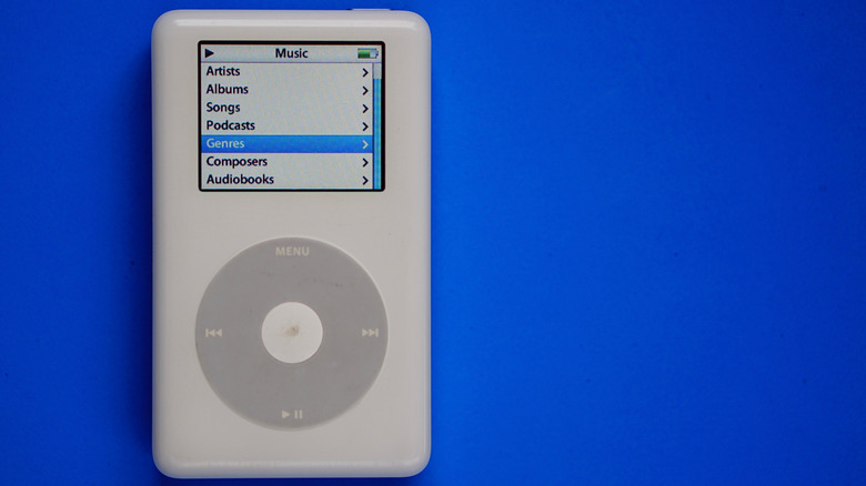 first-generation iPod on a blue background