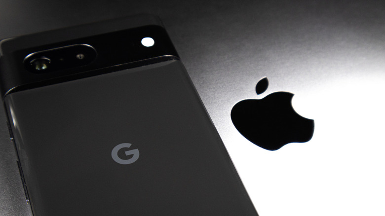 A Google Pixel phone next to an Apple logo.