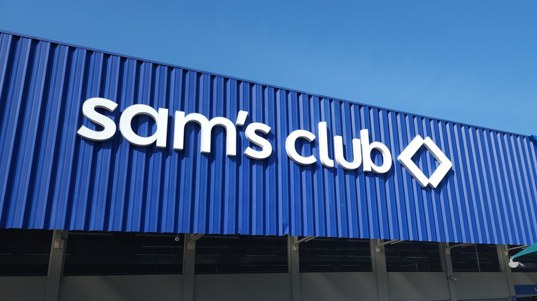 The logo of Sam's Club on the facade of a physical store.