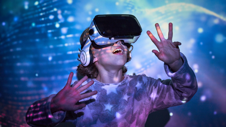 A child wearing a virtual reality headset,