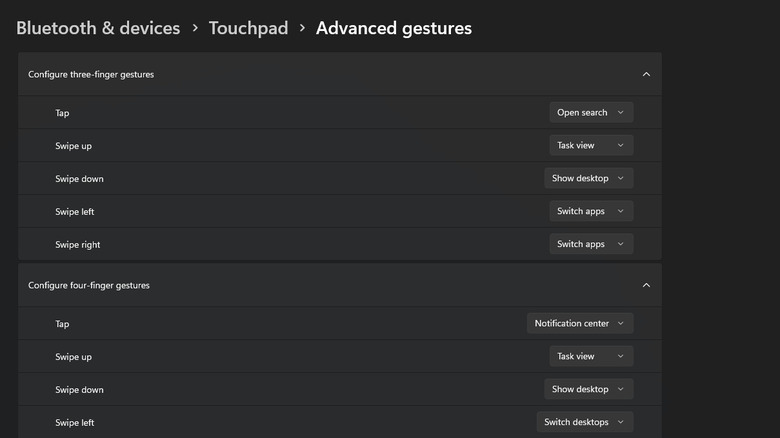 A screenshot of Advanced gestures inside Windows 11's Touchpad settings showing various three-finger and four-finger gesture options