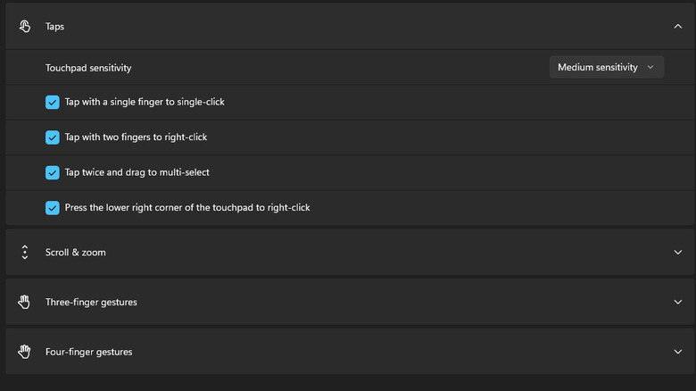 The Taps sub-menu in Windows 11 settings showing various gestures that are selected and turned on by default, including two-finger right-clicks
