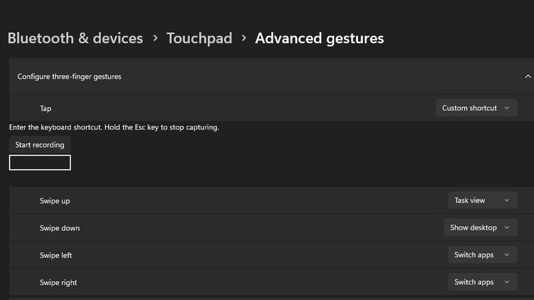 A Windows 11 screenshot showing the option to start recording a keyboard shortcut with custom shortcut select beside a three-finger tap