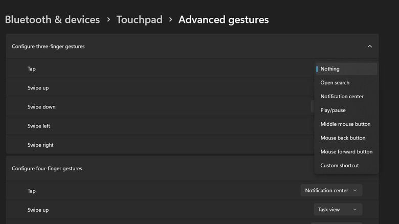 A screenshot of Windows 11 settings showing the Nothing option in a dropdown menu for effects you can make your three-finger tap do