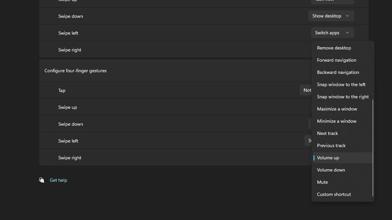 A Windows 11 screenshot showing the Volume up option in a dropdown for effects you can add to three-finger swipes