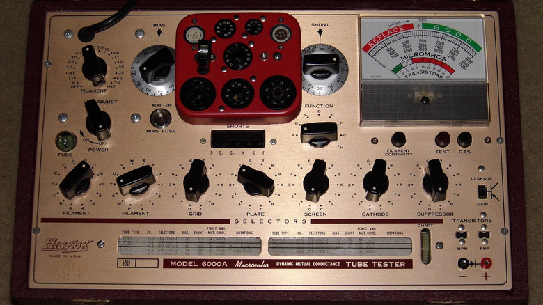Vintage Hickok vacuum tube tester with analog meter and control dials.