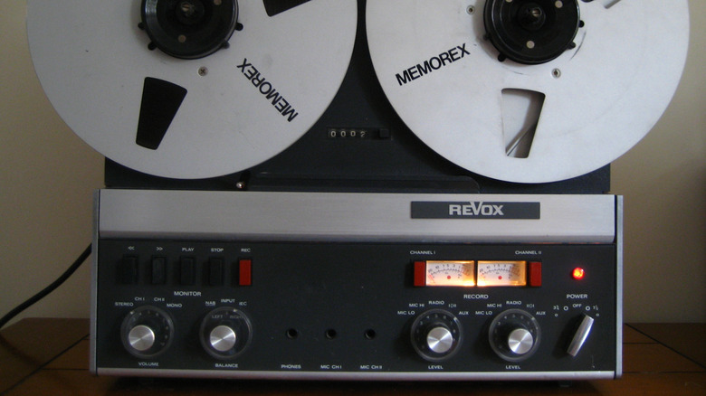 Vintage Revox reel-to-reel tape recorder with twin tape reels.