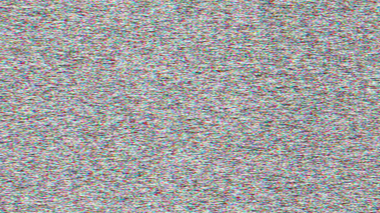 A full-screen image of multicolored television static.