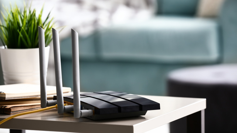 A black router on a table top