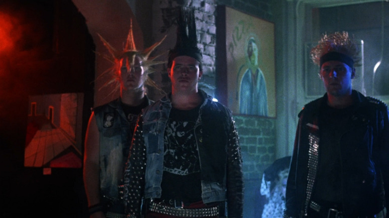 Three men with wild hair in the movie Trancers.