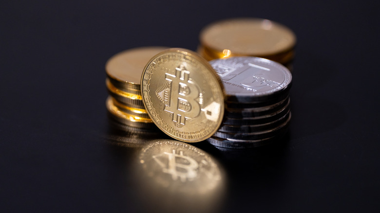 Various cryptocurrencies in physical coins