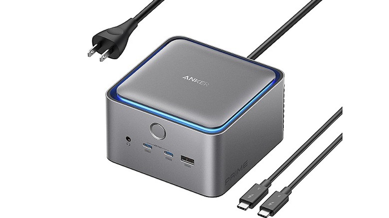 Silver dock with two USB-C cables, and a plug.