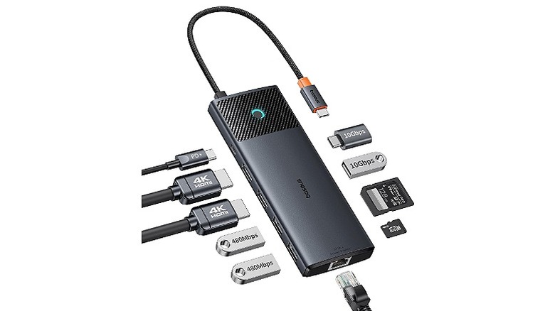Baseus dock with multiple cables, USBs, and memory cards on each side.