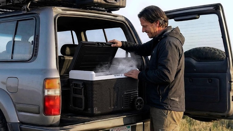 The Euhomy Rover W2 car refrigerator at the back of a vehicle.