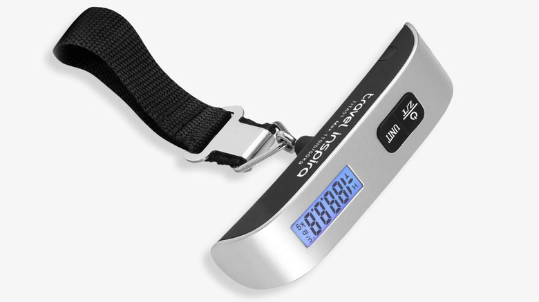 A Travel Inspira Digital Luggage 110 lbs scale with LCD display