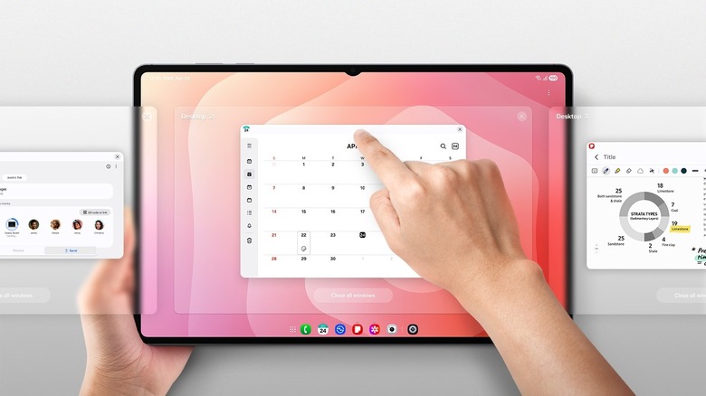 A person's hands operate a Samsung tablet in DeX mode.